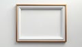 Minimalist gold, white rectangular picture frame hangs on plain white background. It features clean modern design perfect for Royalty Free Stock Photo
