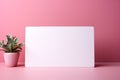 Minimalist grace: Blank white card on pastel pink, awaiting your heartfelt words.