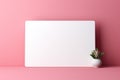 Minimalist grace: Blank white card on pastel pink, awaiting your heartfelt words.