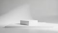 Minimalist gray rectangular block on low white platform against soft gradient background Royalty Free Stock Photo