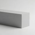Minimalist gray rectangular object on white surface Royalty Free Stock Photo
