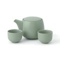 A minimalist green ceramic tea set, consisting of a teapot and two teacups. Royalty Free Stock Photo