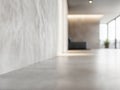 A minimalist hallway features a continuous microcement floor and wall, creating a seamless and spacious feel