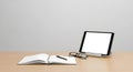 Minimalist home office desk with digital tablet and notebook Royalty Free Stock Photo