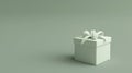 A minimalist image featuring a small, elegantly wrapped white gift box with a ribbon, placed on a monochromatic light green Royalty Free Stock Photo