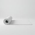 Rolled Up Light Gray Yoga Mat on a White Background Royalty Free Stock Photo