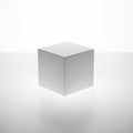 Minimalist image of a white three dimensional cube suspended Royalty Free Stock Photo