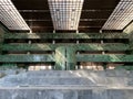 Minimalist interior of an entrance hall inside old Communist building with a green marble walls and glass ceiling Royalty Free Stock Photo