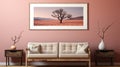 Minimalist interior room with sofa, table, vase of flowers and big photo frame view of trees in desert at sunset