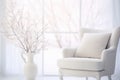 Minimalist interior with white armchair and frosted branches, symbolizing tranquil elegance.- AI Generated
