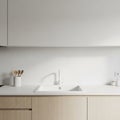 Minimalist kitchen featuring a sleek white countertop and an integrated white sink with a modern Royalty Free Stock Photo