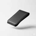 minimalist leather money clip in black Royalty Free Stock Photo