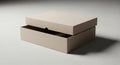 Minimalist beige rectangular box with its lid slightly ajar, casting a shadow on a neutral gray surface Royalty Free Stock Photo