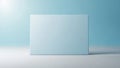 Minimalist light blue rectangular box centered on a clean white surface with soft blue background Royalty Free Stock Photo