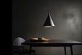 a minimalist lighting fixture with a single lamp and sleek design