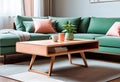 Minimalist living room design with wooden coffee table near the sofa close up Royalty Free Stock Photo