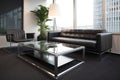 minimalist living room with sleek black leather sofa and glass coffee table Royalty Free Stock Photo