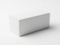 Minimalist metallic rectangular object on white surface Royalty Free Stock Photo