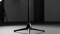 Minimalist Microphone Stand in Black and White Studio Setting Royalty Free Stock Photo