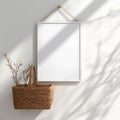Minimalist Mockup: White Frame with Woven Basket and Dried Branches Royalty Free Stock Photo