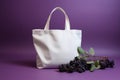 minimalist mockup of white shopping bag with blueberry sprig on lilac background