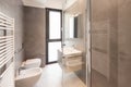 Minimalist modern bathroom with large tiles