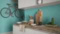 Minimalist modern kitchen close up with healthy breakfast, contemporary white and turquoise interior design