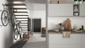 Minimalist modern kitchen with healthy breakfast, living room and wooden staircase, contemporary white and wooden interior
