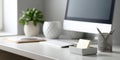 Minimalist modern workspace with desktop computer, keyboard, sticky notes, pen holder, and decorative plants on a clean white desk Royalty Free Stock Photo