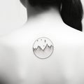 Minimalist Mountain And Moon Tattoo On Woman\'s Back