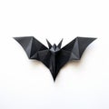Minimalist Origami Bat: Dark Tonalities And Intricate Compositions