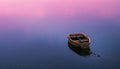 Minimalist photo of a boat with the rise of the tide. San Vicente de la Barquera, Cantabria, Spain.