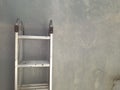Minimalist photography : folding ladder a wall