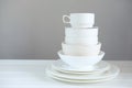 Minimalist picture of white porcelain kitchenware piled up Royalty Free Stock Photo