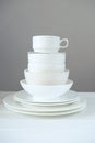 Minimalist picture of white porcelain kitchenware piled up Royalty Free Stock Photo