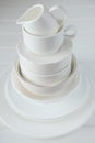 Minimalist picture of white porcelain kitchenware piled up Royalty Free Stock Photo