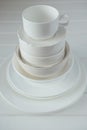 Minimalist picture of white porcelain kitchenware piled up Royalty Free Stock Photo