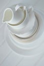 Minimalist picture of white porcelain kitchenware piled up Royalty Free Stock Photo