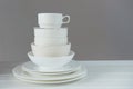 Minimalist picture of white porcelain kitchenware piled up Royalty Free Stock Photo