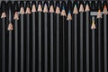 Minimalist picture of writing instruments: a lot of color pencils next to each other on isolated white background Royalty Free Stock Photo