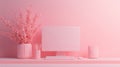 Minimalist pink home office setup with computer showing blank screen
