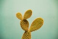 Minimalist prickly pear with blue background