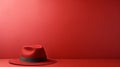 Minimalist Red Fedora Hat On Solid Background With Copy Space