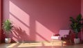 Minimalist room with pink wall has armchair and plants. Sunlight streams through window casting shadow patterns on floor and Royalty Free Stock Photo