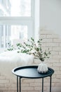 Minimalist Scandinavian home interior, coffee table arrangement in white room