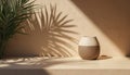 Minimalist scene featuring a modern ceramic vase on a concrete table surface. Soft sunlight creates elegant palm leaf shadows on Royalty Free Stock Photo