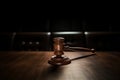 Symbol of Authority: Gavel on Wooden Table