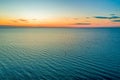 Minimalist seascape of dusk over water.