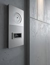 Sleek Security Access Panel on Concrete Wall Royalty Free Stock Photo