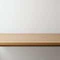 A minimalist setting featuring a wooden tabletop against a plain white background. Th Royalty Free Stock Photo